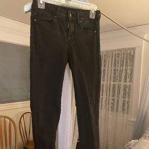 Black divided muddies skinny jeans